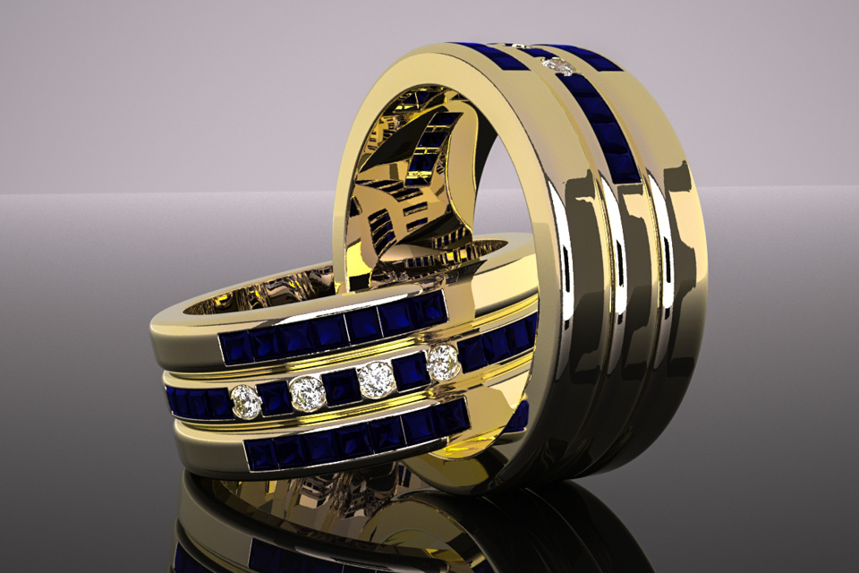 Custom Design: 14k ywllow gold band set with a customers spare princess saphires and brilliant diamonds.