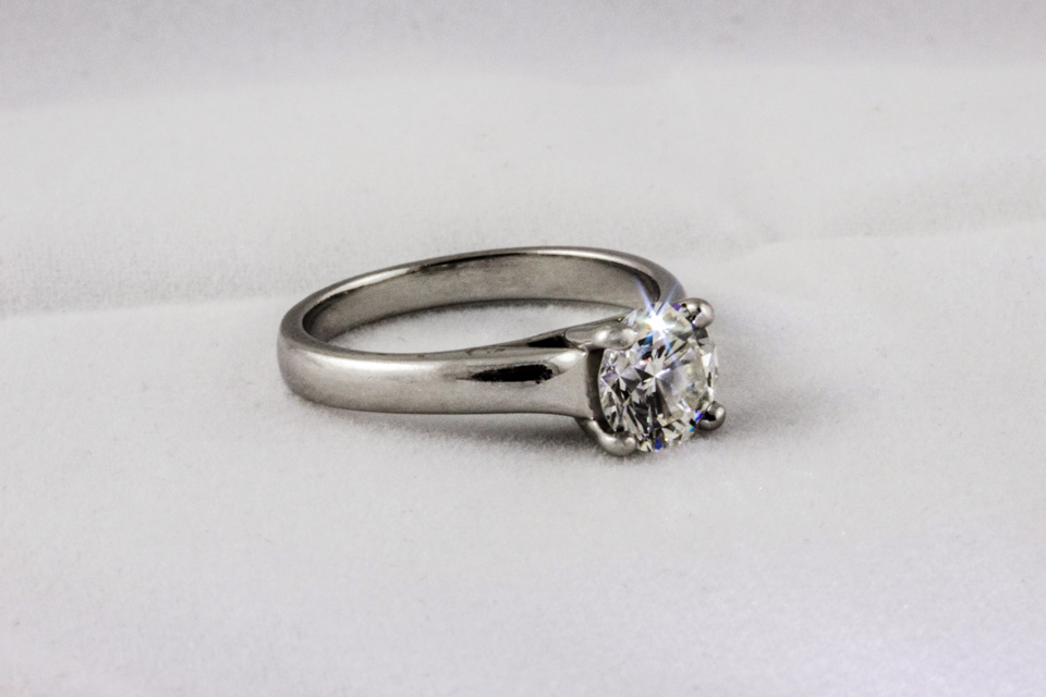 Understated Elegance And Fire: An excellent cut 1 ct diamond produces a lot of fire and scintillation.  Set in platinum.
